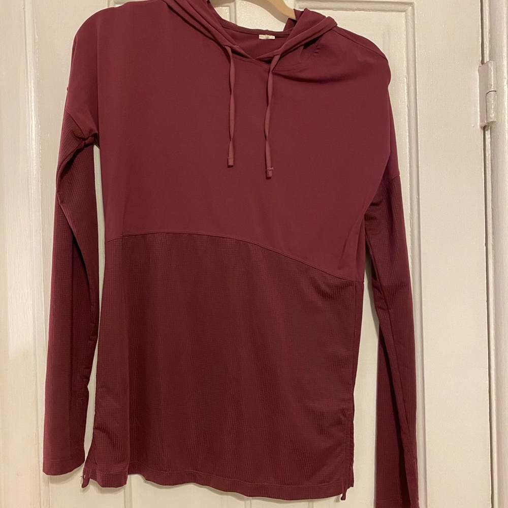 Purple athletic material pull over from Fabletics